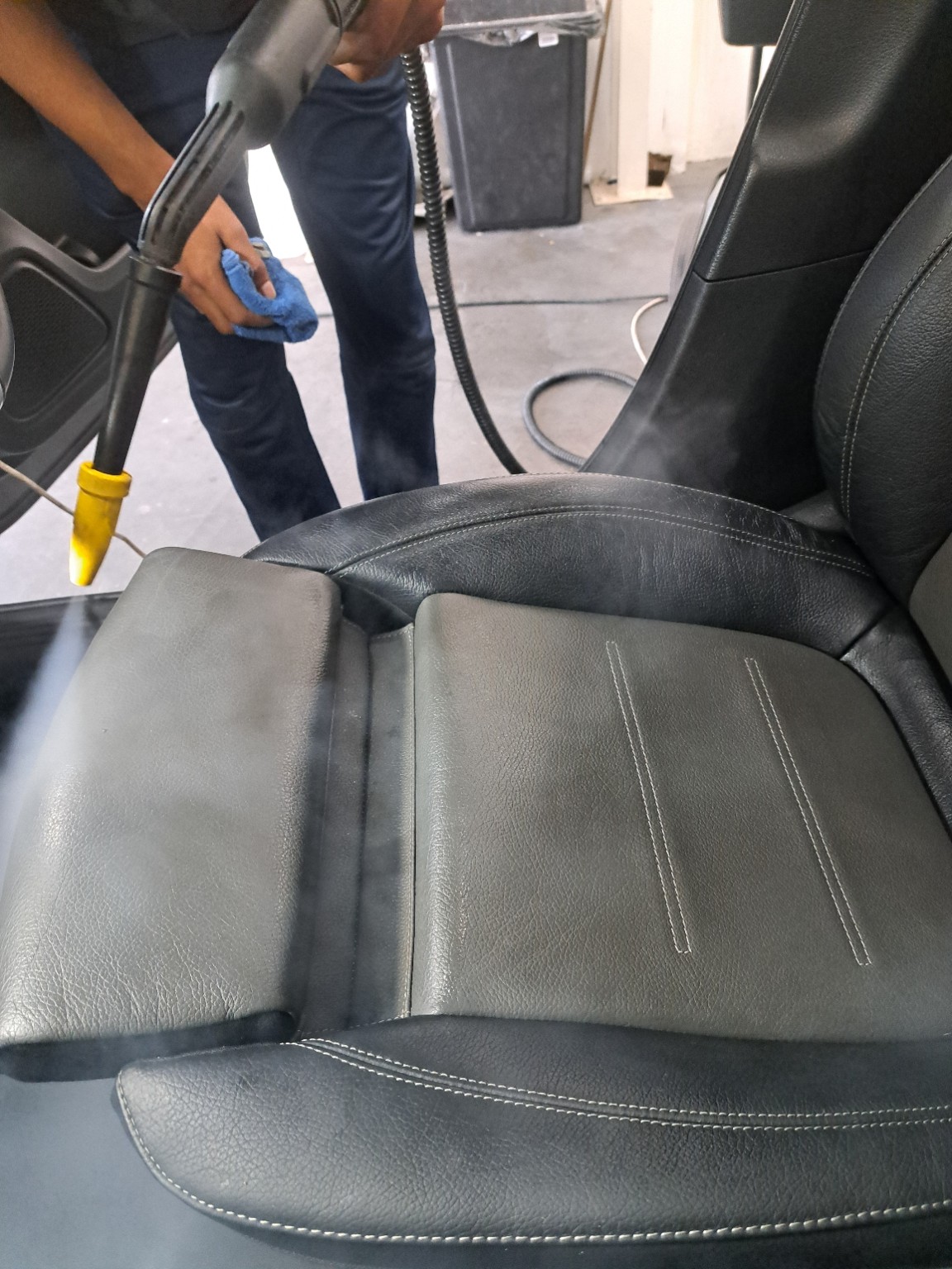 Professional vehicle interior steam cleaning