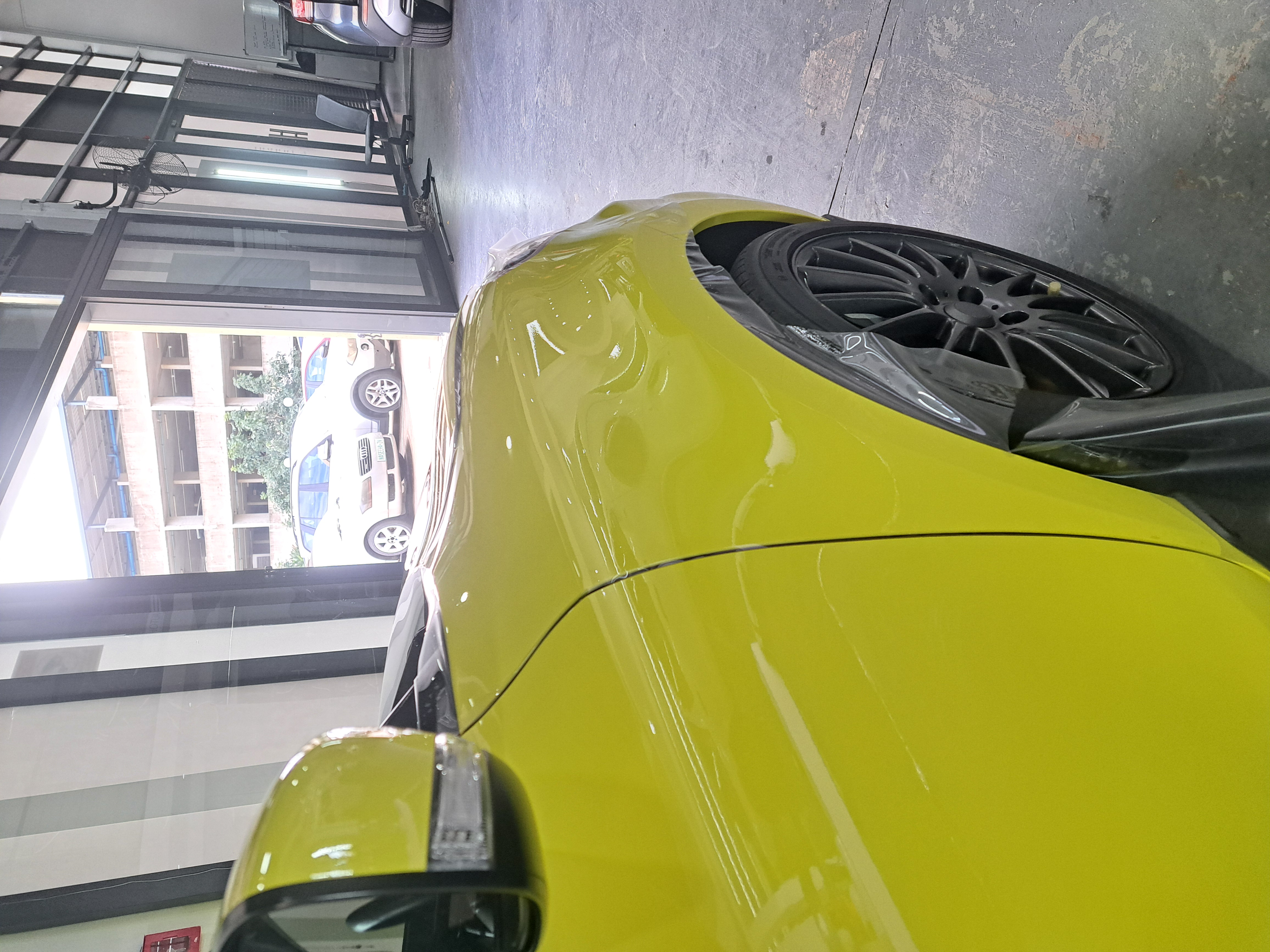 Protected gloss paint finish after vehicle protection work